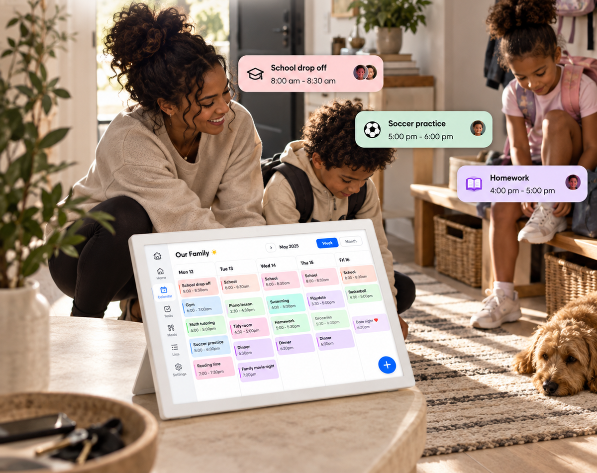Mom and son checking the week's schedule on PlanPal while daughter grabs her backpack